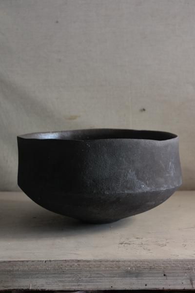 Matte black ceramic bowl.